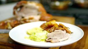 slow-roast-shoulder-of-pork-with-roasties-and-apple-sauce-with-hispi-cabbage