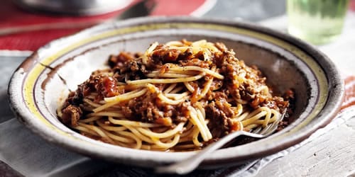 Hairy Bikers spag bol on a plate with a fork