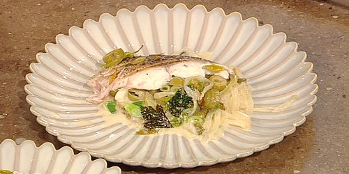 Roast sea bream in wine and cream with olives and capers