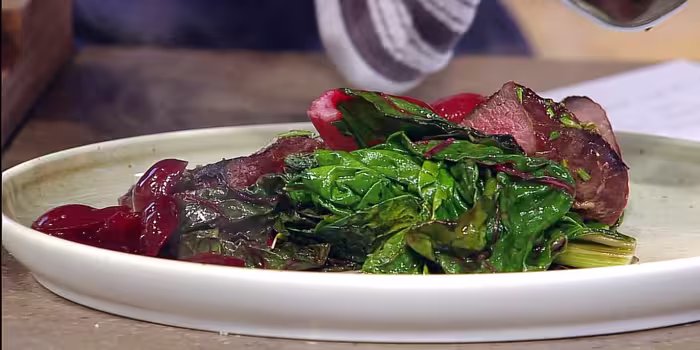 Grilled venison steak with cherries