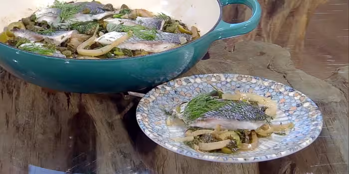 Fillet of sea bream with olives and capers