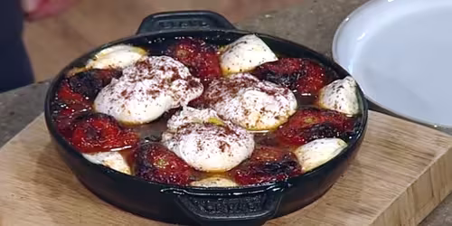 Baked-chilli-tomatoes-with-poached-eggs-and-mozzarella.avif