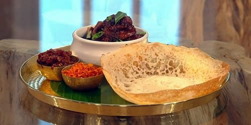 Black-pork-curry-with-hoppers.jpg