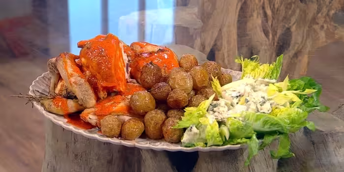 Buffalo-roast-chicken-with-a-blue-cheese-salad.avif
