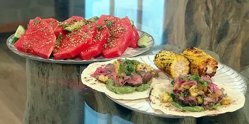 Carne-asada-tacos-with-watermelon-salad.webp