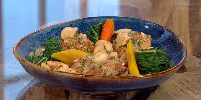 Chicken-thighs-with-40-cloves-of-garlic-chard-and-heritage-carrots.avif