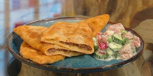 Crimean-Tatar-ciberek-with-Ukrainian-radish-and-tomato-salad.jpg