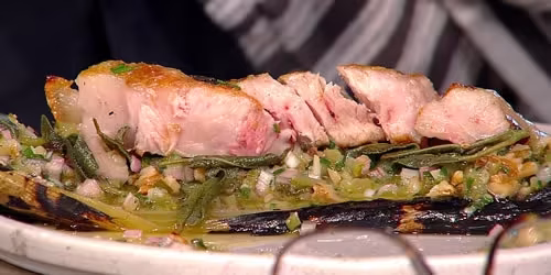 Crispy-Pork-Chop-with-Burnt-Leeks-and-Gherkin-Vinaigrette.avif