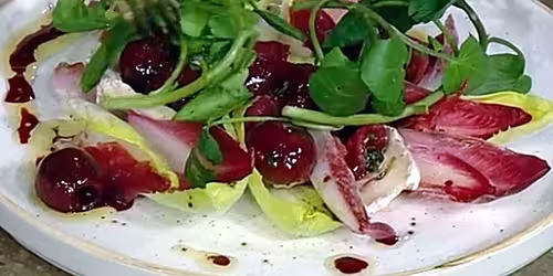 Cured-duck-ham-with-goats-cheese-and-cherries.avif