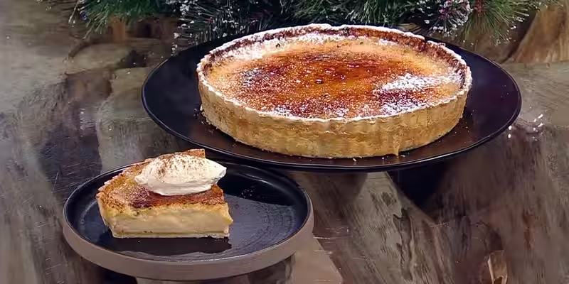 Eggnog-style-custard-tart-with-rum-and-nutmeg-cream.avif