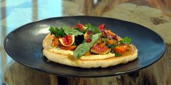 Flatbread-with-hummus-purple-sprouting-broccoli-basil-and-pomegranate-dressing.jpg