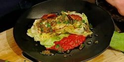 Grilled-hispi-cabbage-with-romesco-sauce-and-bacon-dressing.jpg