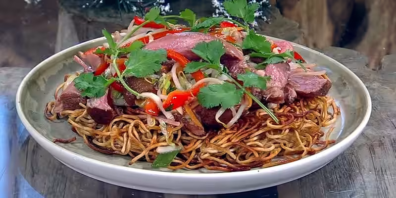 Ham-hock-with-yellow-bean-sauce-chow-mein.avif