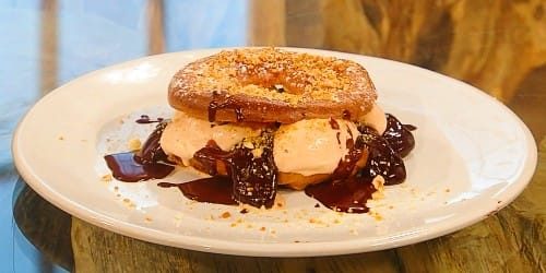 Hazelnut-Paris-Brest-with-hazelnut-ice-cream-and-warm-chocolate-sauce.jpg