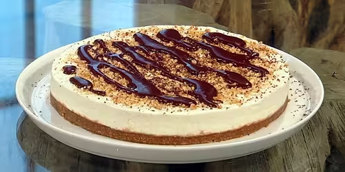 Hazelnut-biscuit-and-ricotta-cake-with-toffee-sauce.avif