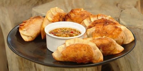 Korean-dumplings-with-chilli-dipping-sauce.jpg