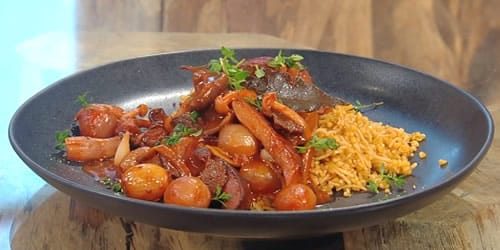 Manitaria-stifado-with-bulgur-wheat-pilafi.jpg