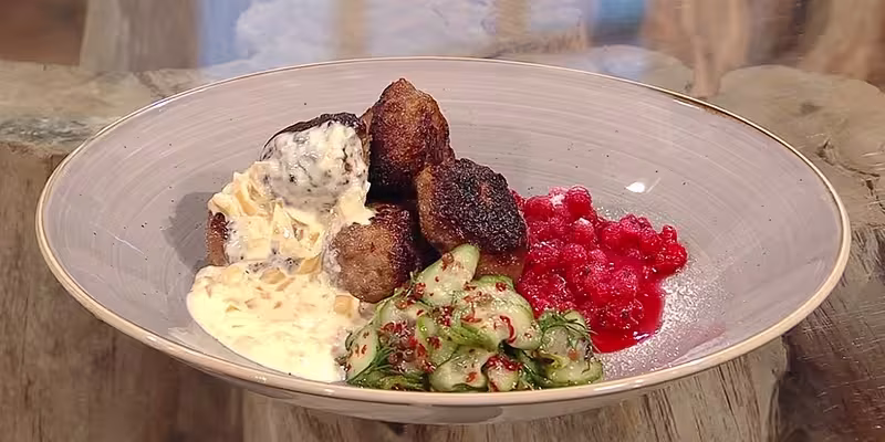 Meatballs-with-shaken-redcurrants-and-pink-peppercorn-pickled-cucumbers.avif