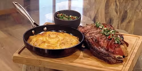 Rib-eye-on-the-bone-chimichurri-pommes-Anna.avif