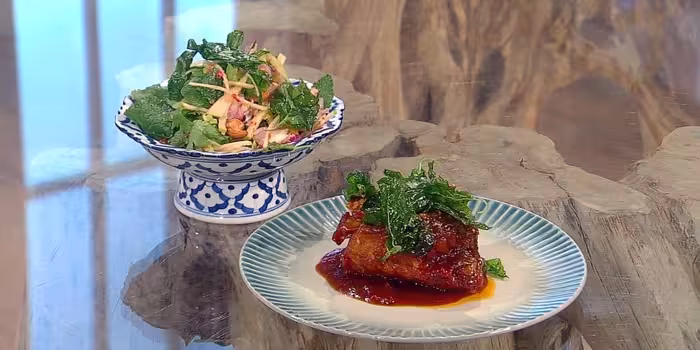 Sea-bass-with-sweet-and-sour-sauce-and-green-apple-and-cashew-salad.avif