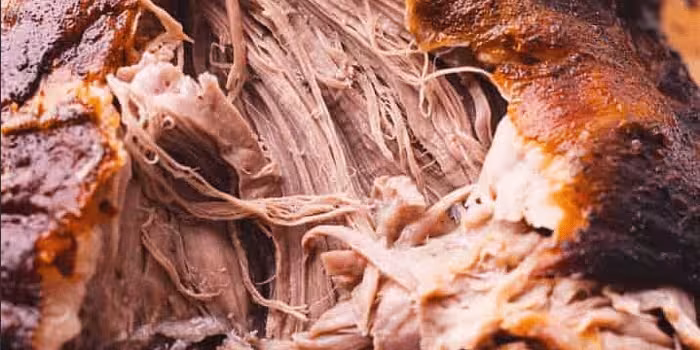 Shoulder-of-Lamb-roasted-shredded.avif