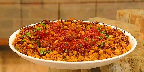 Spiced-lamb-kefta-in-tomato-sauce-with-spiced-chickpeas-bulgur-wheat-and-fried-onions.jpg