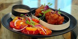 Tropical-salt-fish-fritters-‘zing-ting-aioli-and-a-winter-citrus-salad.jpg