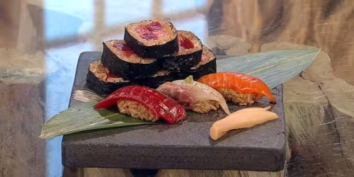 Tuna-sea-bass-and-trout-nigiri-and-British-tuna-rolls.avif