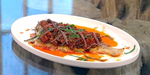 Whole-grilled-sole-with-olives-anchovy-and-tomato-vinaigrette.avif